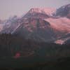 The green hill makes room for the snowy mountains in Lushfoil photography sim.