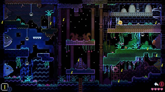 A complex and colorful area in animal wells with large animal heads on the wall around a central platform