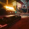 A street scene in Cyberpunk 2077 with rail traces.