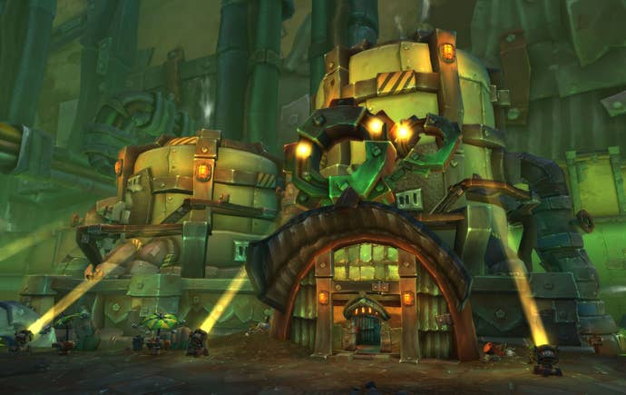 A giant metal building with arches and lights from the city of Goblin Undermine in World of Warcraft