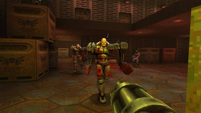 Players point out a minigun into the Cybord enemy in Quake 2.