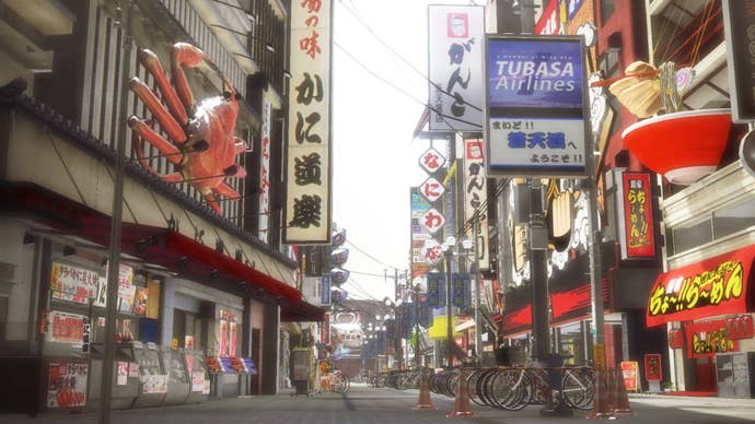 A city road from Yakuza 5, filled with colorful stores and signs.